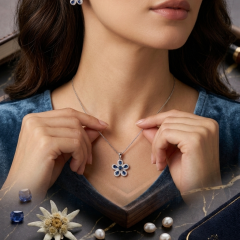Sapphire Bloom: Sterling Silver Flower Pendant & Earrings Set