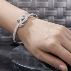 The Entwined Elegance Pavé Knot Bangle