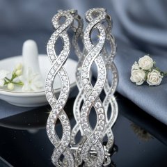 The Infinity Twist Pavé Silver Bangles