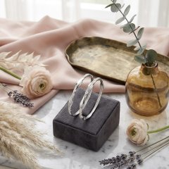 The Ribbon Twist Pavé Silver Bangles